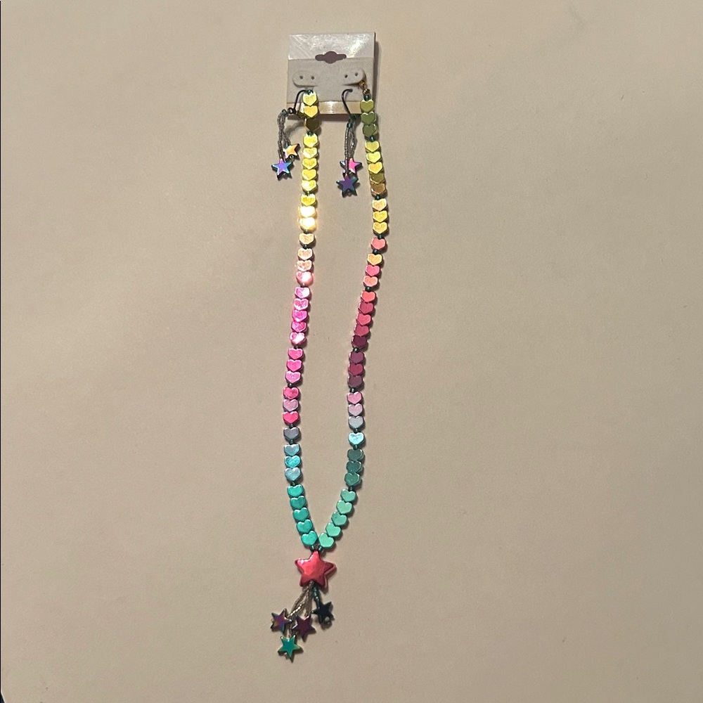Made with love. Metal hearts, and glass stars.